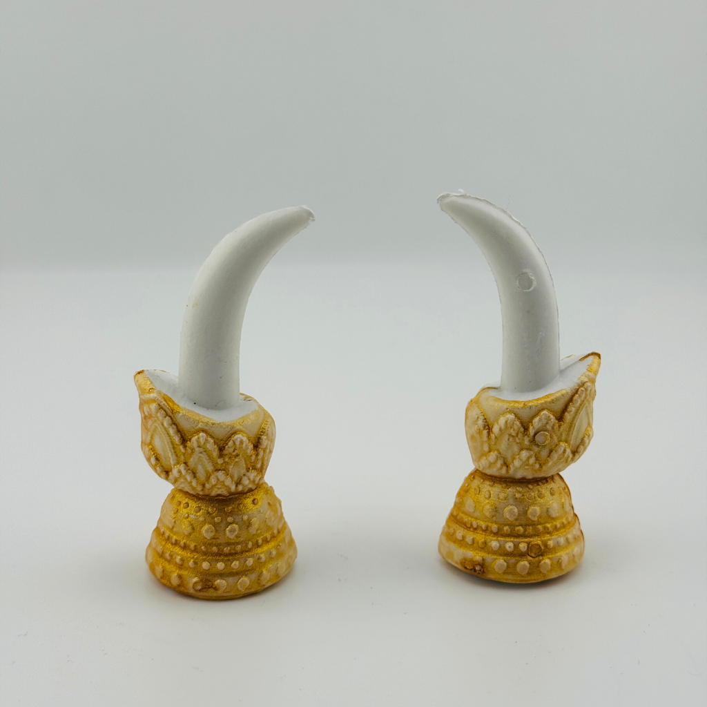 White and Gold Elephant Tusk Decor