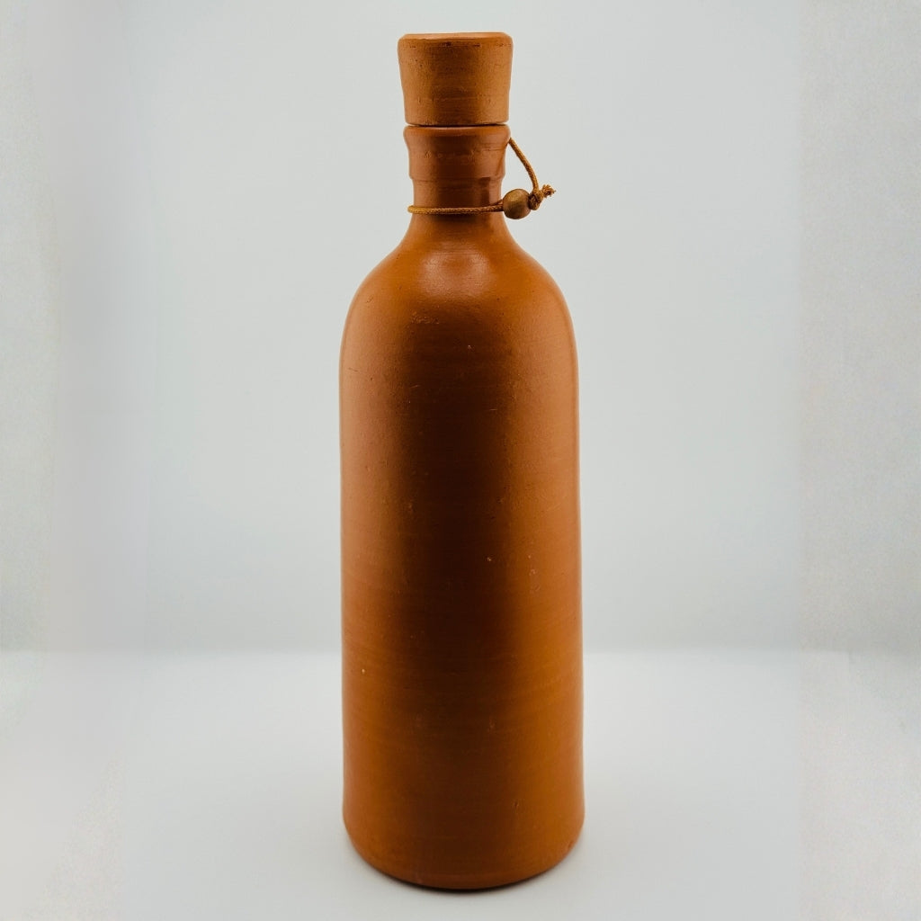 Handmade clay bottle with wooden lid and decorative rope detail – natural terracotta finish