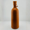 Handmade clay bottle with wooden lid and decorative rope detail – natural terracotta finish