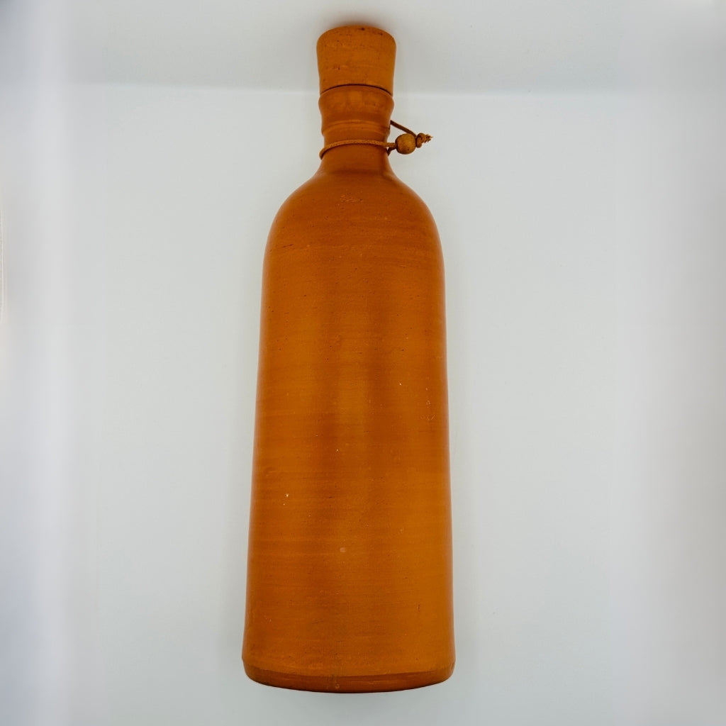 Side profile of eco-friendly clay water bottle with rope handle – 12 inch height